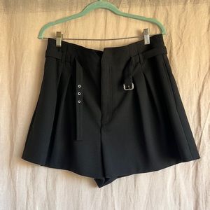 Black shorts. VALENTINO